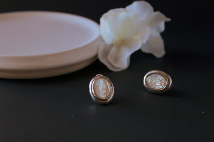 Silver oval religious earrings